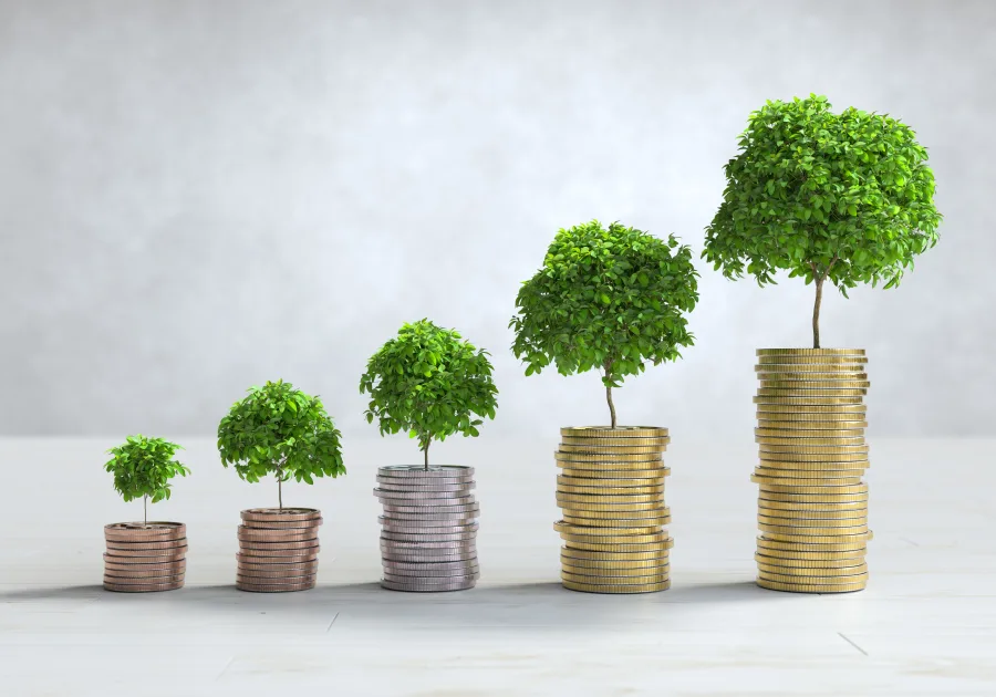 Five rising stacks of coins, each with a small tree growing out of it